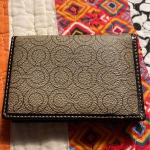 Coach men’s wallet.